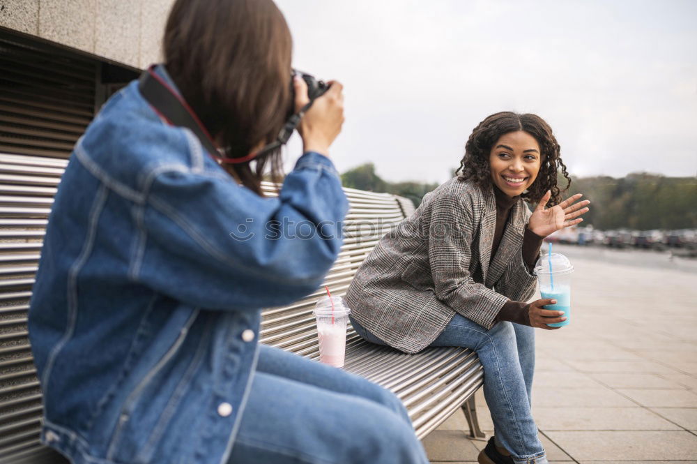 Similar – Image, Stock Photo Girl taking photo of her friend with smartphone