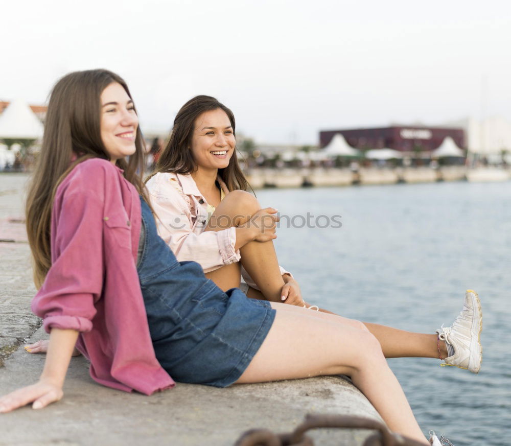 Caucasian Teenager girls enjoying ice cream on the beac