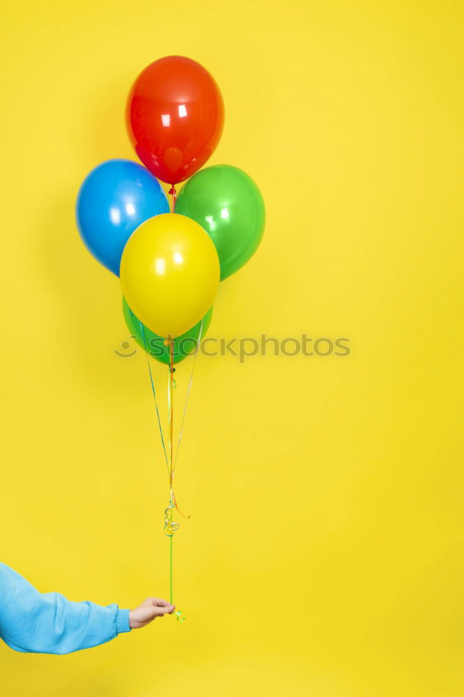 Similar – Image, Stock Photo Hand holding ballooons