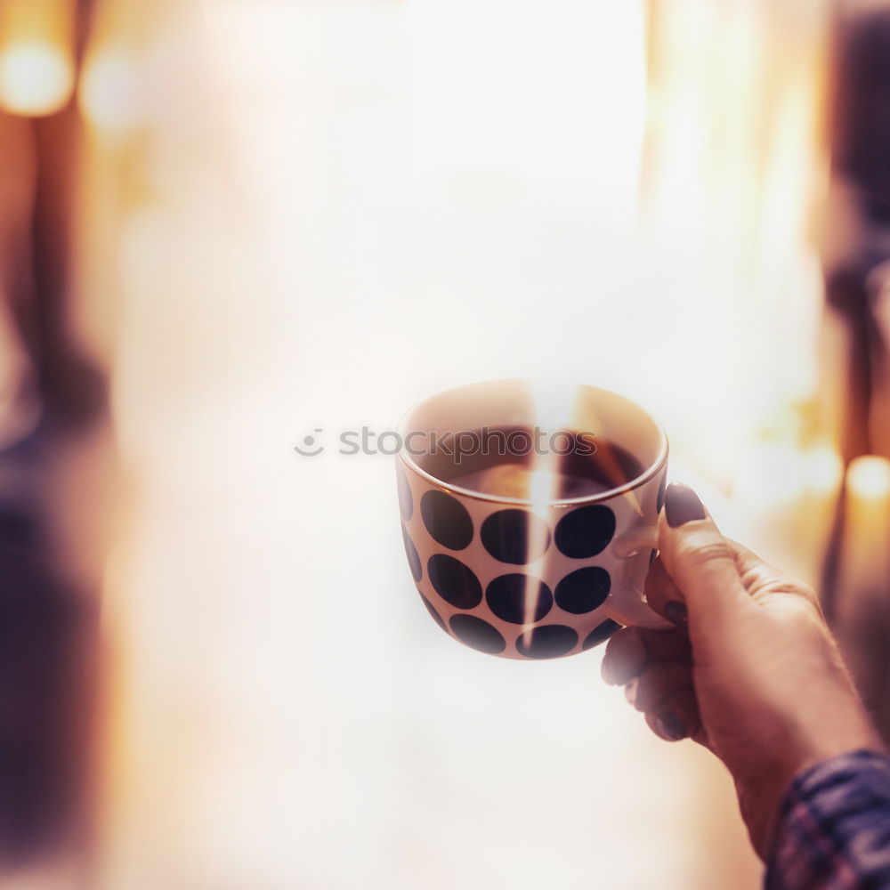 Similar – cozy winter morning at home with hot tea.