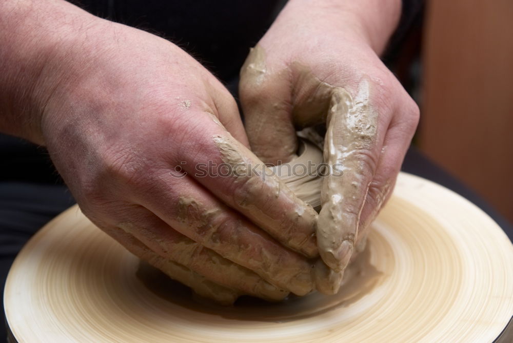 Similar – round wooden sieve in male hands