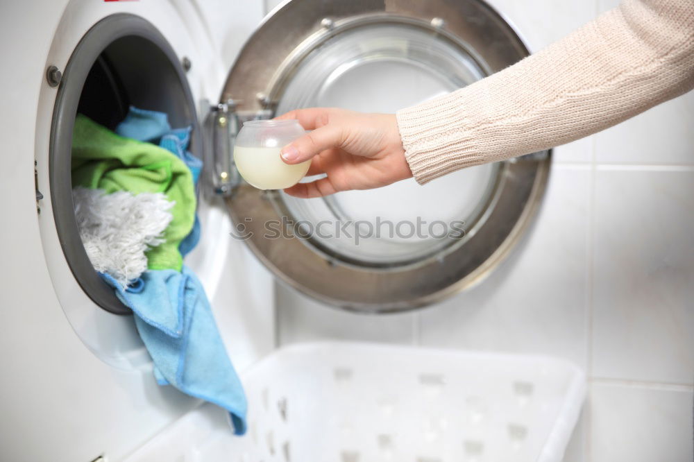 Similar – Face mask in a washing machine, hygiene, disinfection