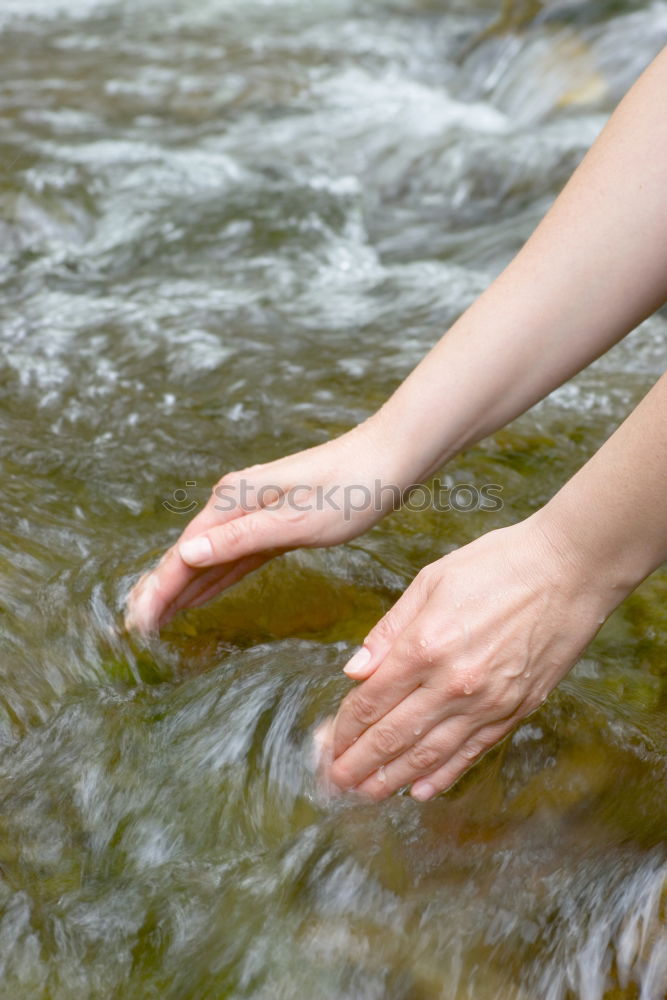 Similar – Image, Stock Photo Hand touching fresh water in a lake