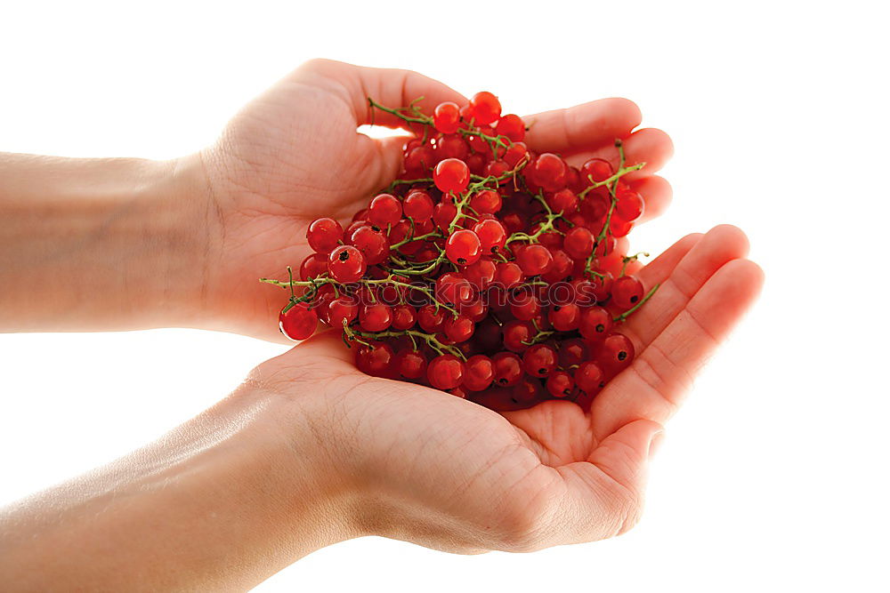 Similar – a handful of berries Food