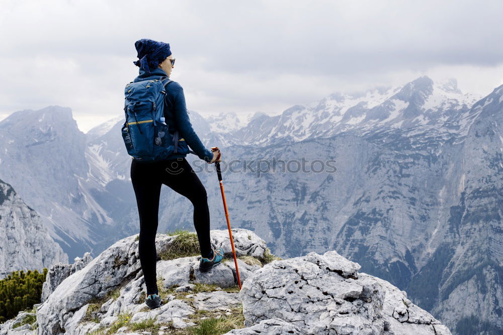 Similar – Foto Bild Frau mit Rucksack und Wanderstöcke