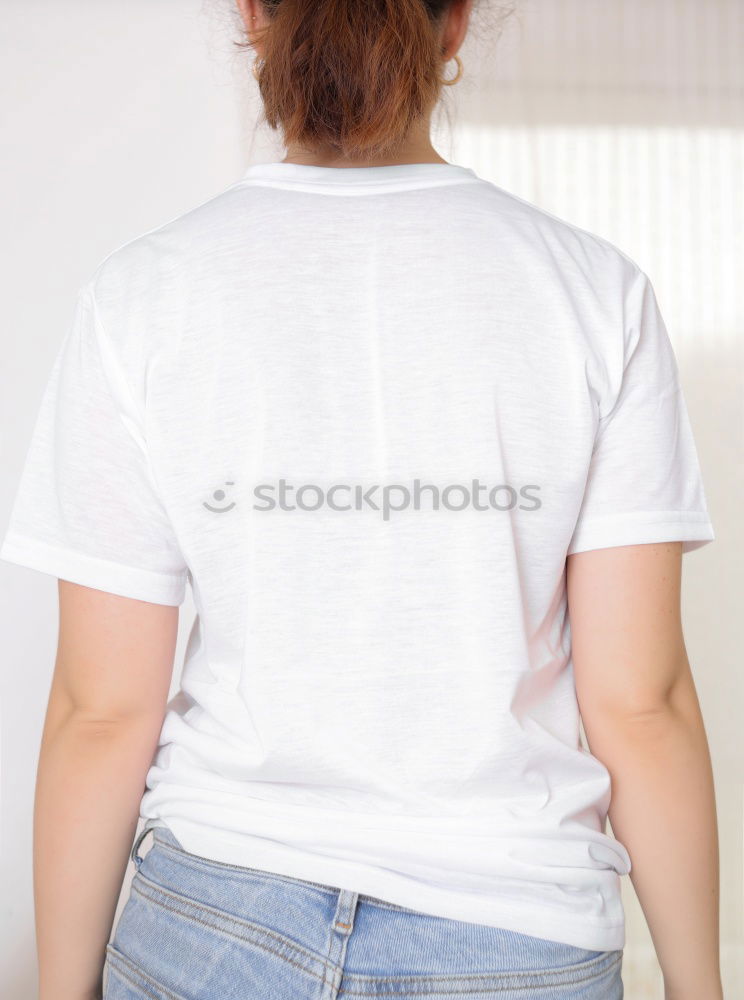 Similar – Image, Stock Photo young redhead woman with curls and freckles sprints barefoot in hot pants in front of white door and smiles