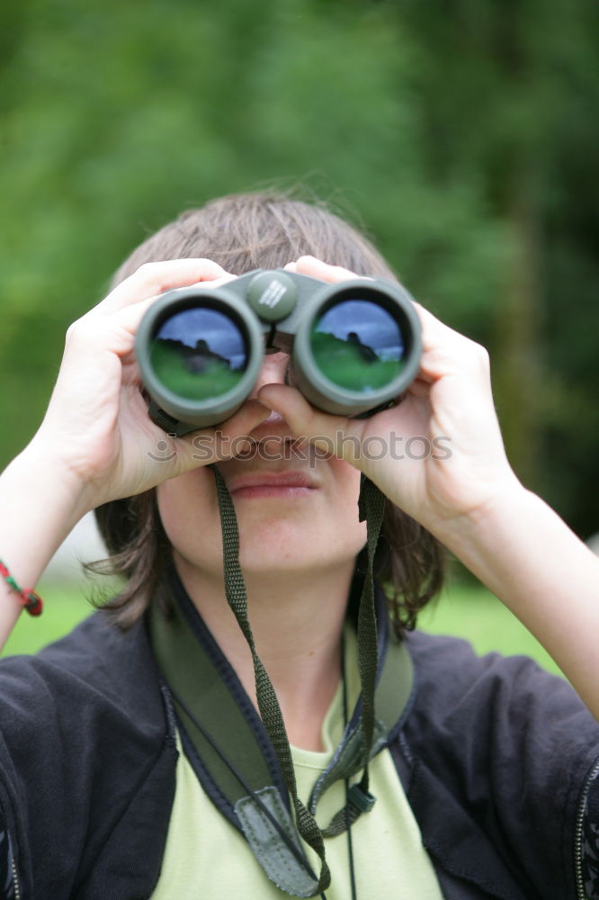 Similar – rothaariger hübscher Teenager, langhaarig mit schwarzer Sonnenbrille, blauer Jacke, orangefarbenem Schirm im Wald