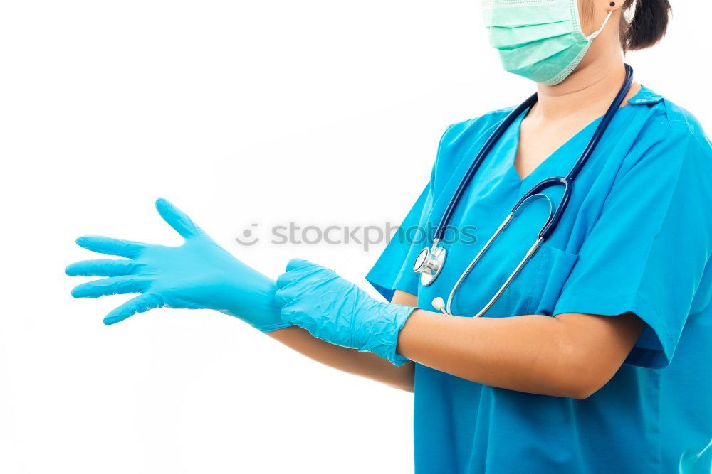 Similar – Image, Stock Photo Female doctor putting on her protective gloves