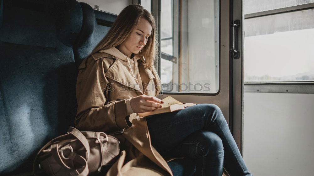 Similar – Attractive teenager sitting on steps in town