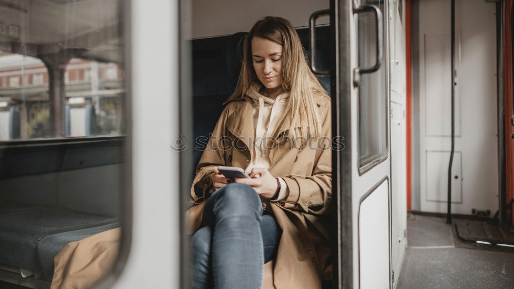 Similar – Attractive teenager sitting on steps in town