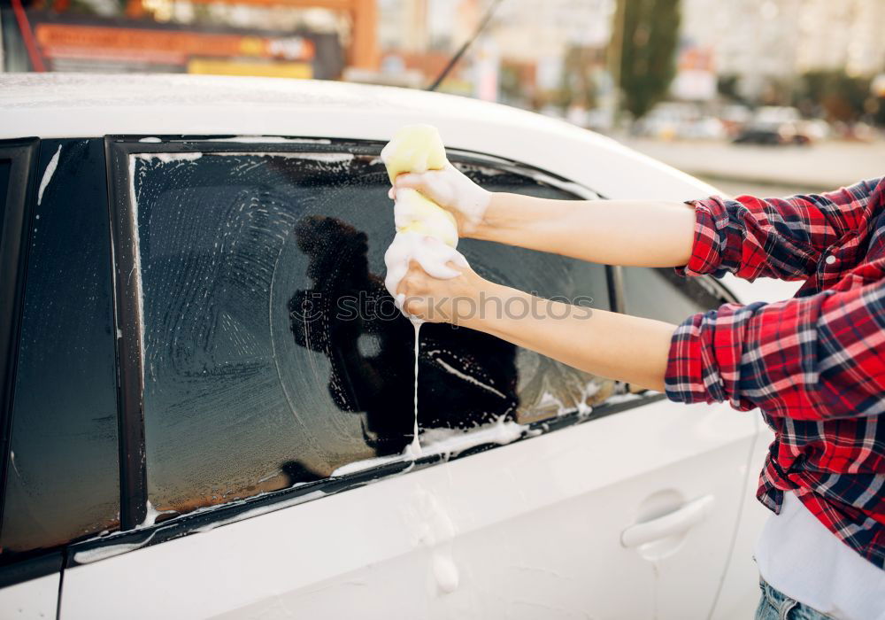 Similar – Image, Stock Photo Man worker washing car with sponge