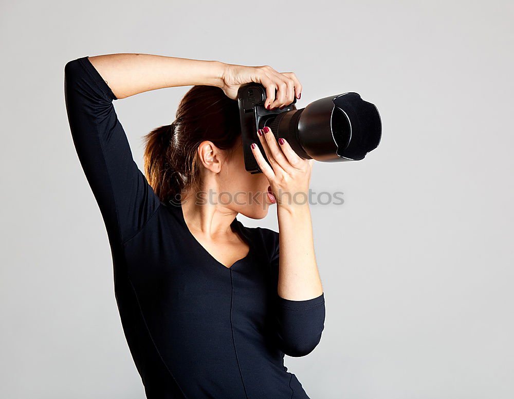 Similar – Woman with digital camera