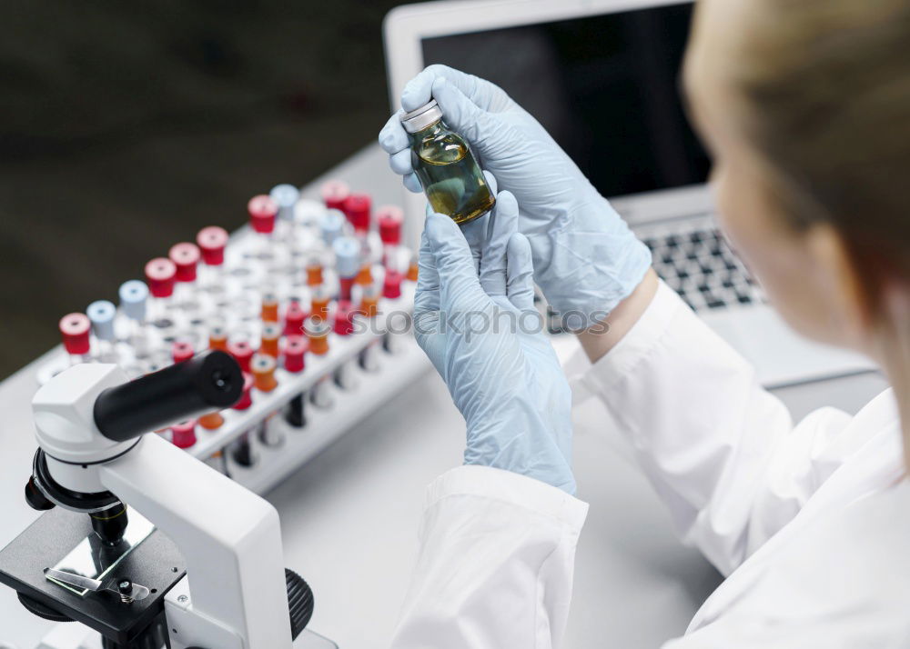 Similar – Image, Stock Photo Hands holding plastic test tube