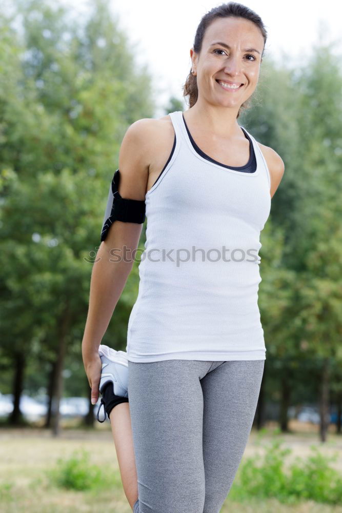 Similar – Image, Stock Photo Happy fit young woman doing stretching exercises