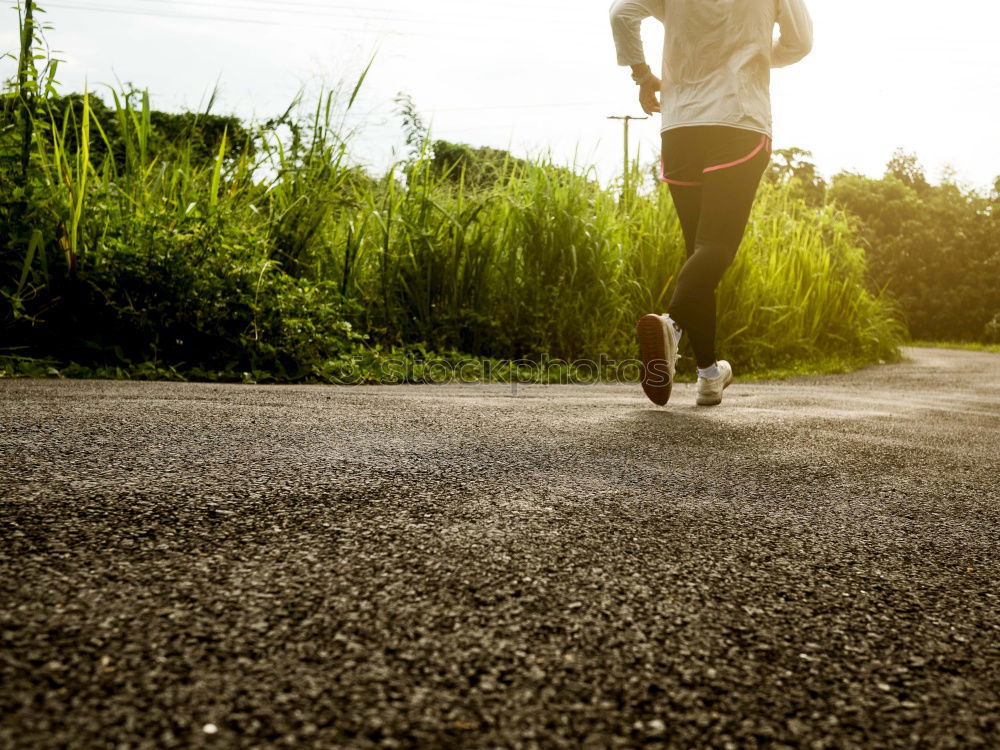 Similar – Image, Stock Photo Close up of legs of runner in the city.