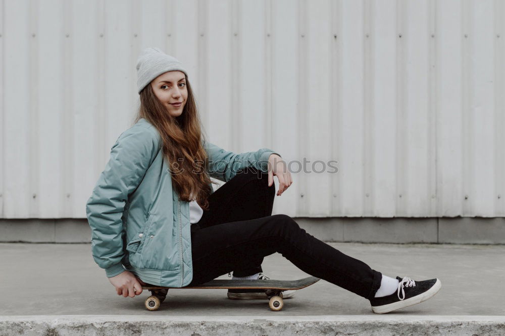 Similar – Cool skateboard woman at a public graffiti park