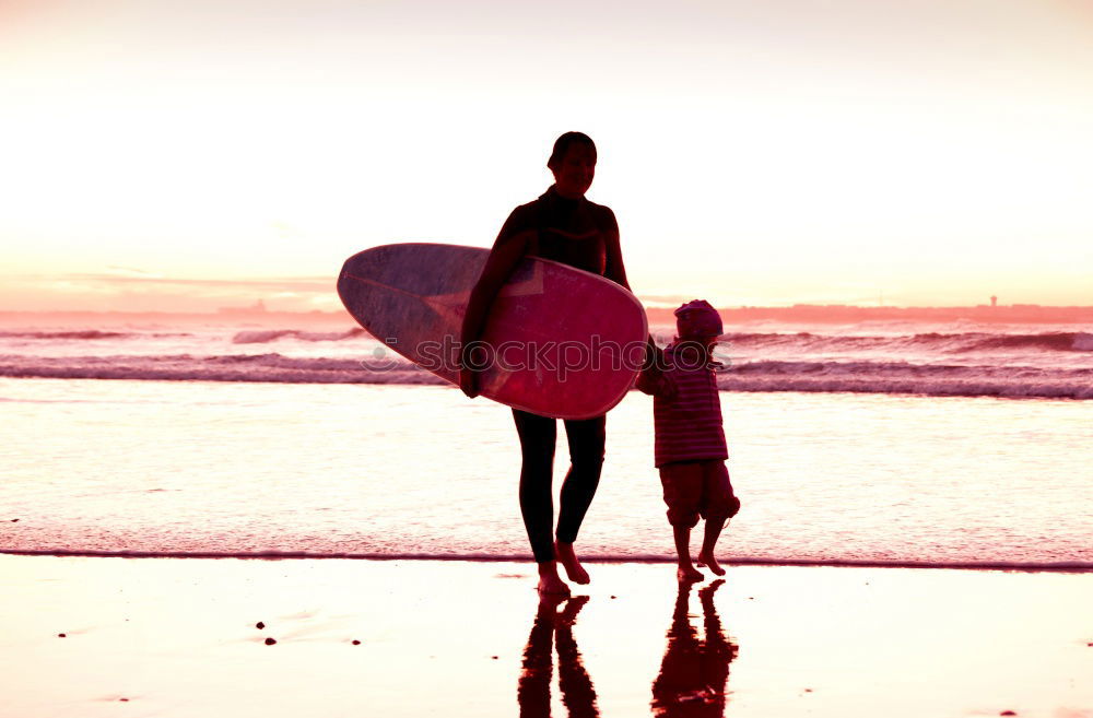 Image, Stock Photo caucasian mother and son practicing surfing