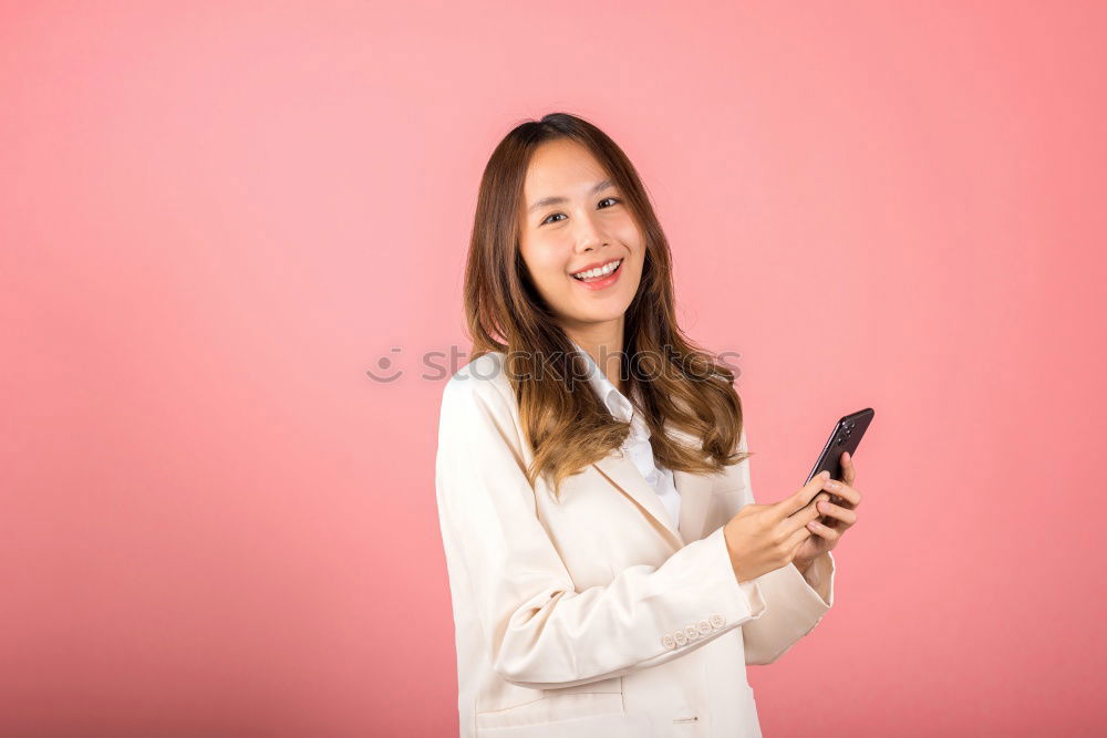 Similar – Happy caucasian women listening to music on smart phone