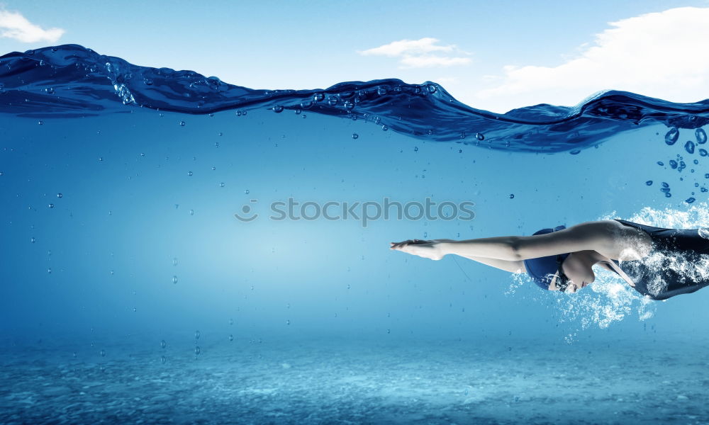 Similar – Image, Stock Photo Young woman diving in the sea