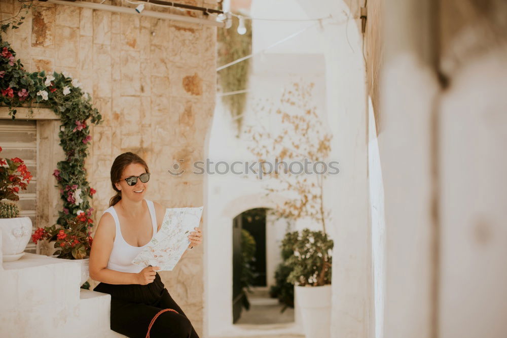Similar – Image, Stock Photo Young tourist woman in yellow dress looking a map