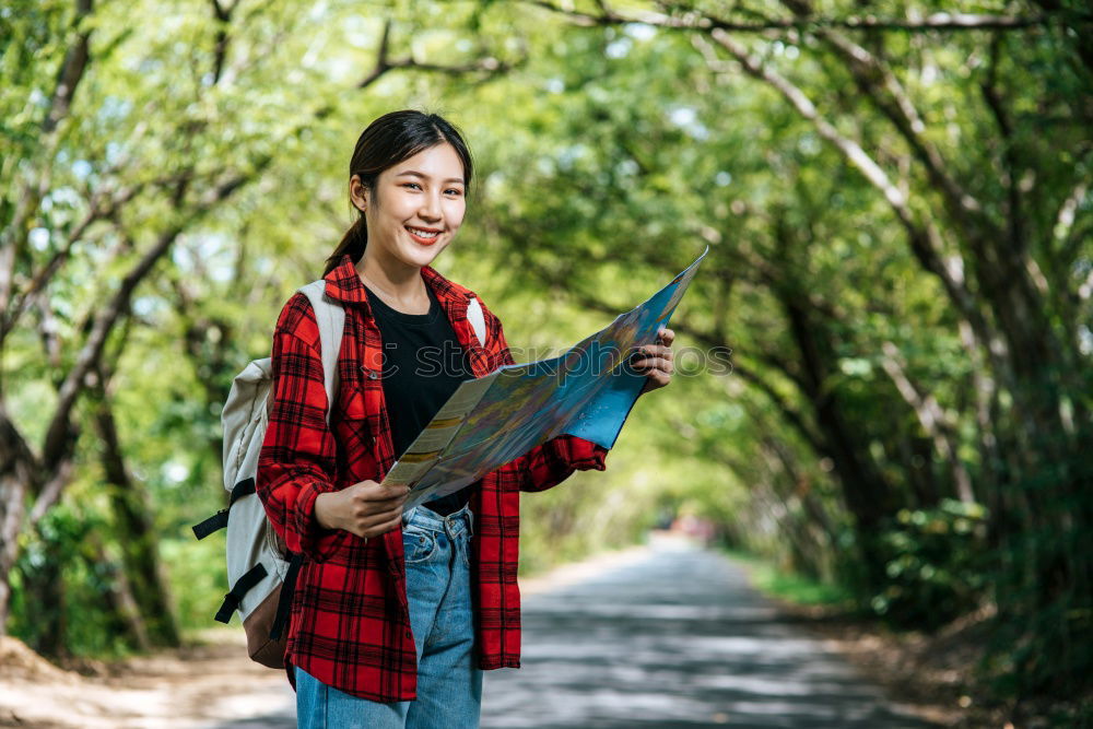 Similar – Image, Stock Photo Man navigating on road in woods