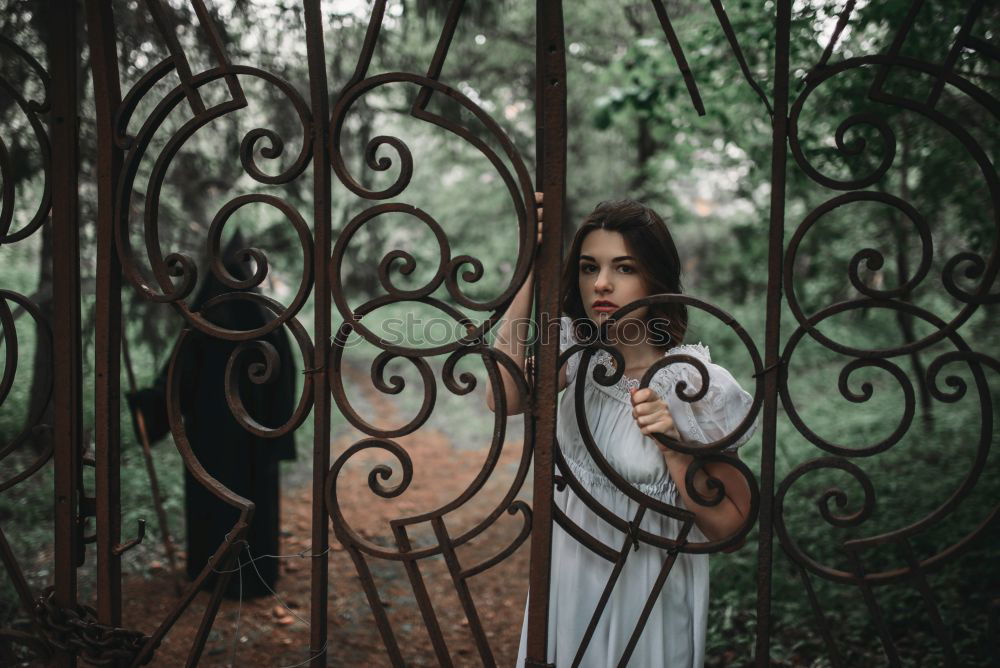 Similar – A Young Woman Standing in the Woods