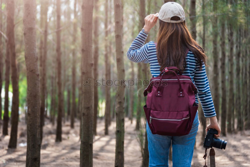 Similar – Image, Stock Photo Man navigating on road in woods