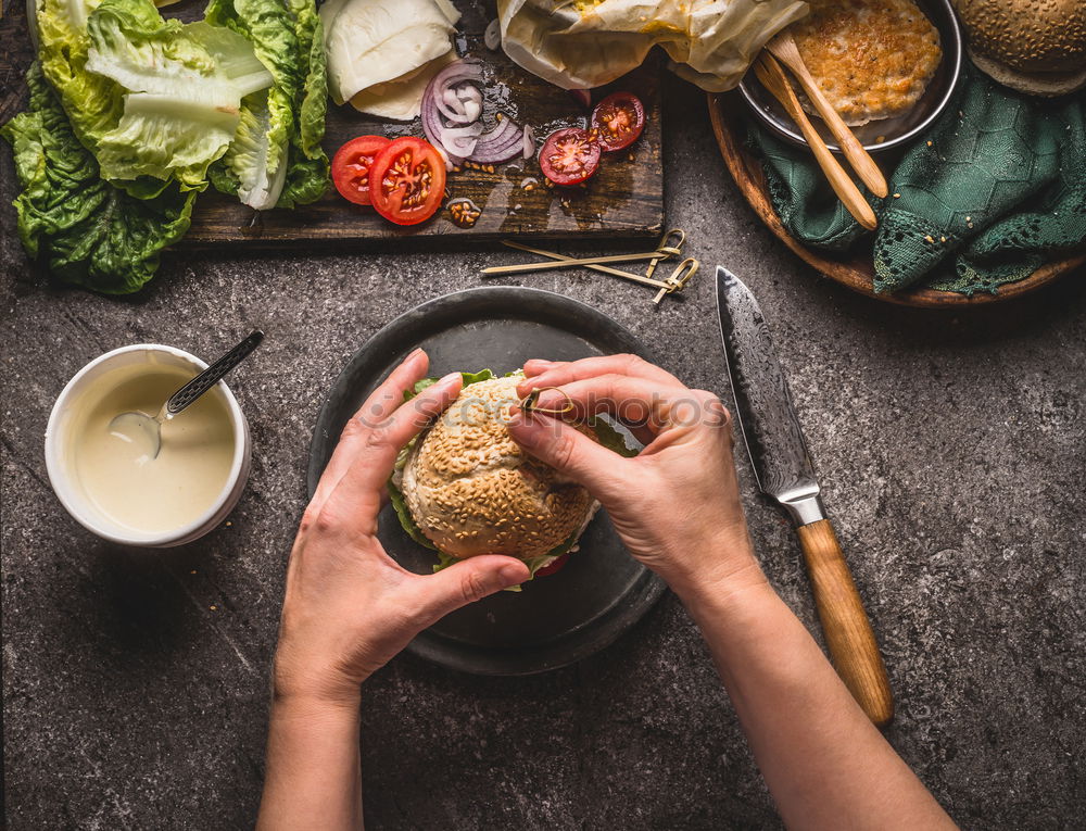 Similar – Image, Stock Photo Female hands hold small wok pot with chopped vegetables