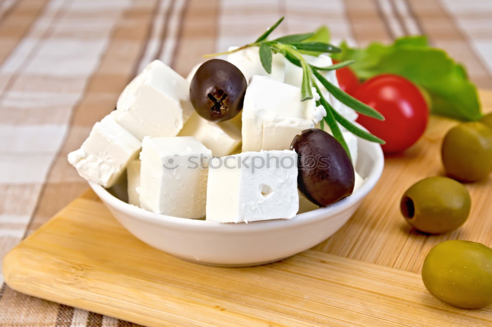 Similar – Italian cheese burrata, tomatoes, basil and bread