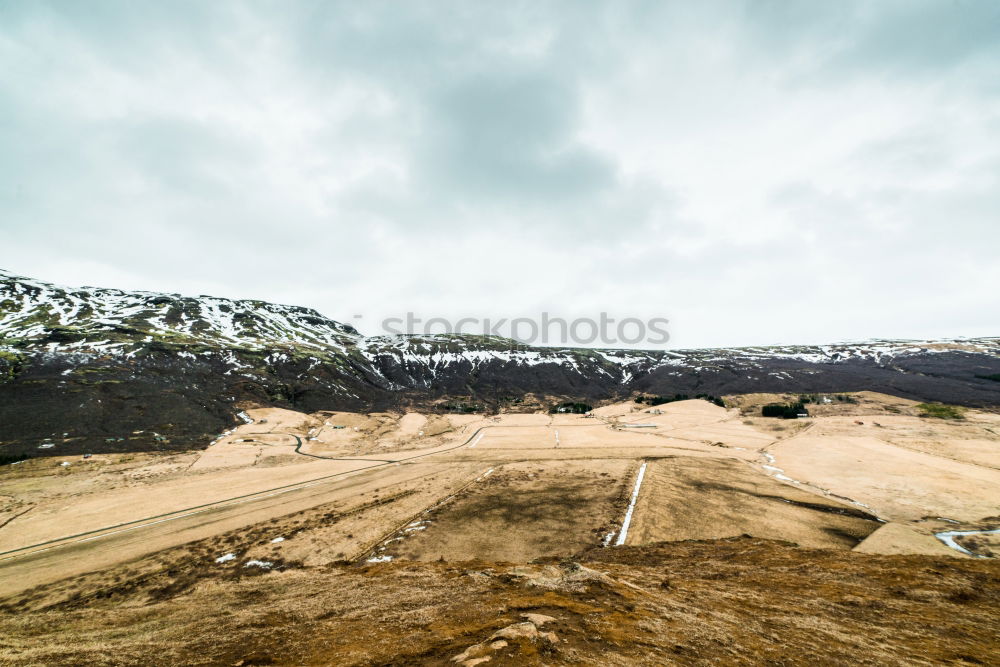 Similar – Desert road and mountains unreal