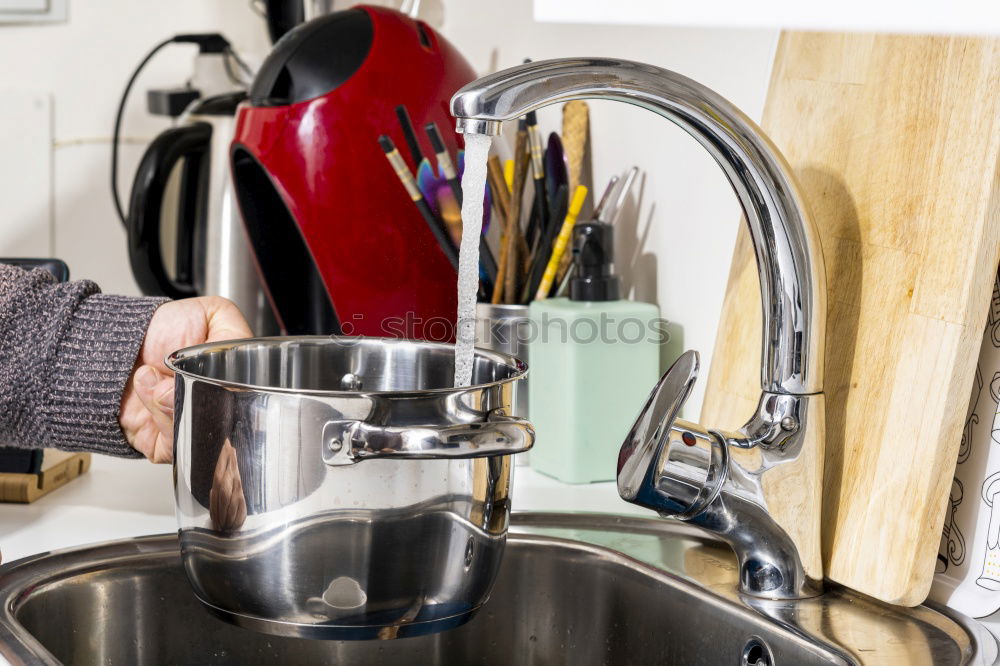 Similar – Image, Stock Photo Woman preparing coffee on stove