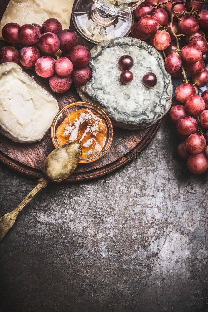 Image, Stock Photo Fine cheeses with wine, grapes and honey sauce