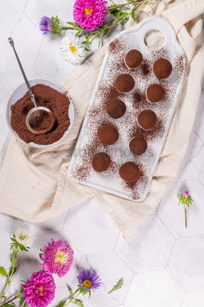 Similar – Image, Stock Photo white etagere with chocolate cake muffin and its preparation