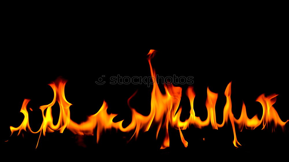 Similar – Close-up of a single flame.