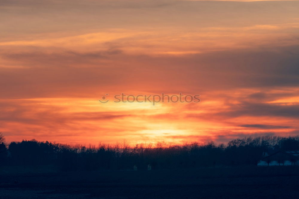 Similar – Red rising sun on top of an electric pole