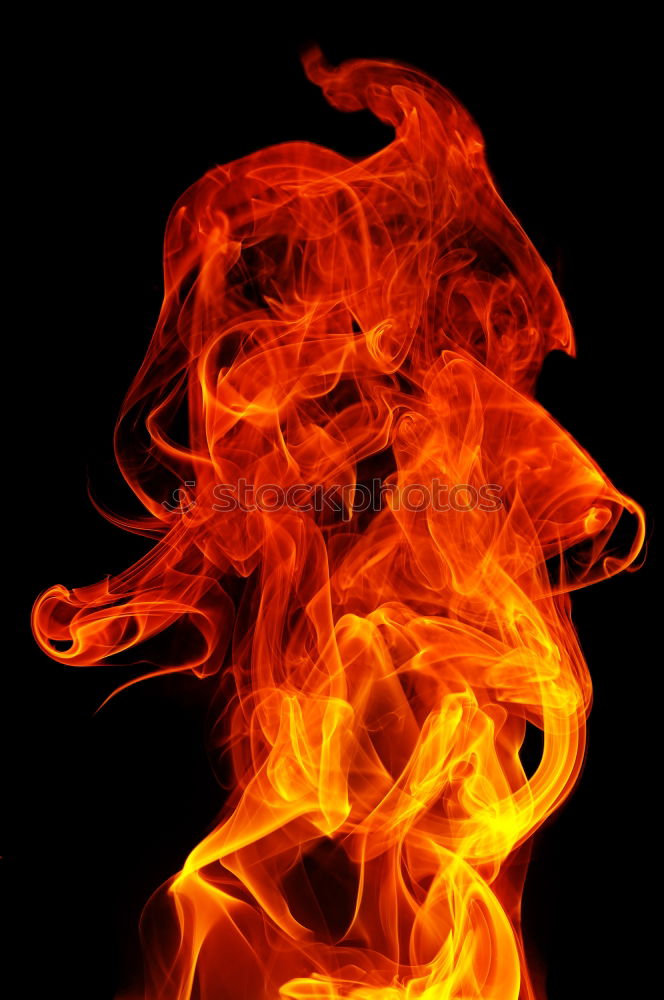 Similar – red fire flame on black background