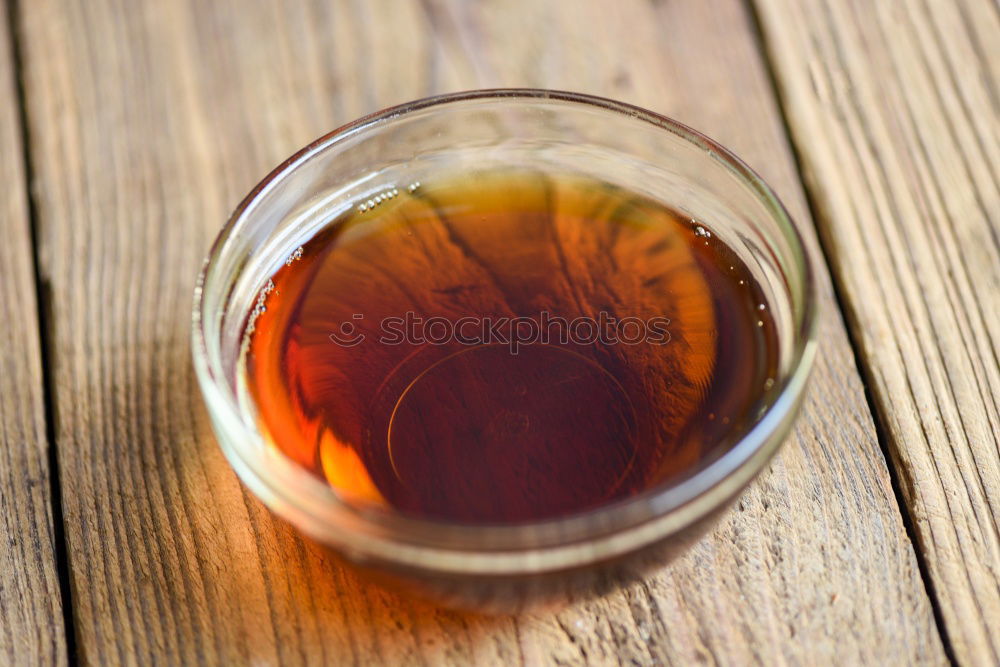 Similar – Glass of whiskey on a wooden table