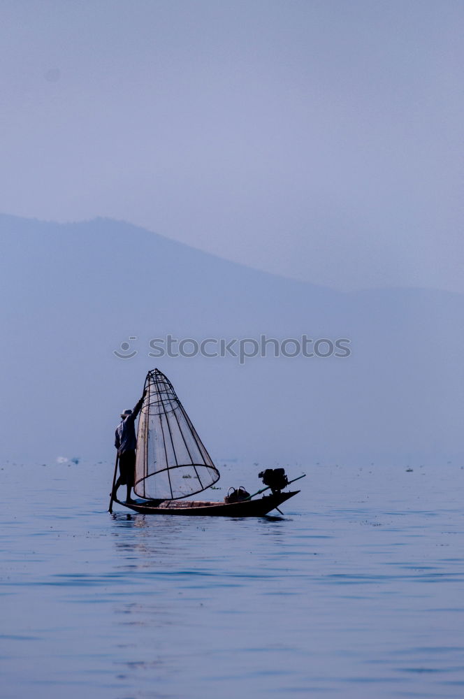 Similar – Fisher at bright Inle Lake