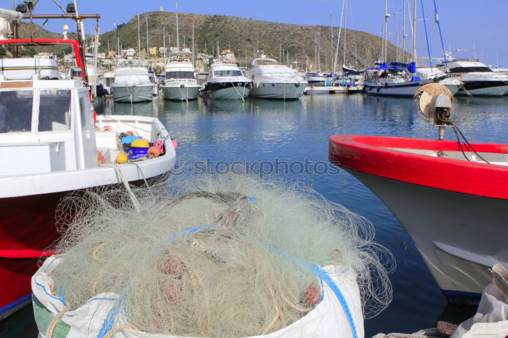 Similar – Image, Stock Photo Fishnets on fish boat. Yellow net.