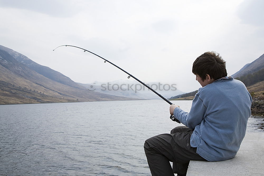 Similar – Image, Stock Photo Man on fishing with rod