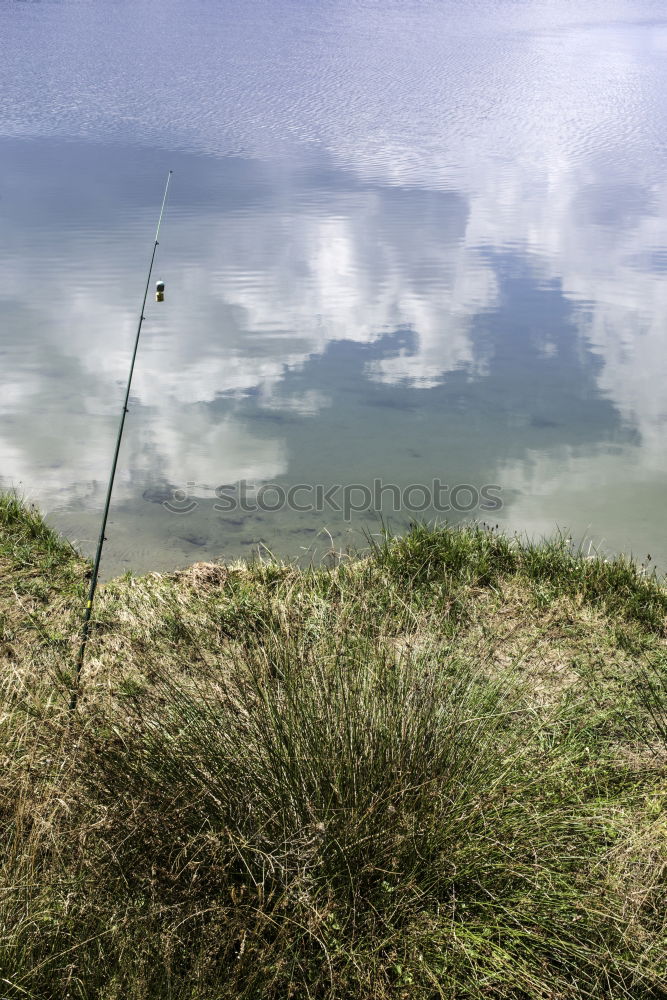 Similar – Image, Stock Photo Open, thawed ice surface on a lake. Climate, climate change