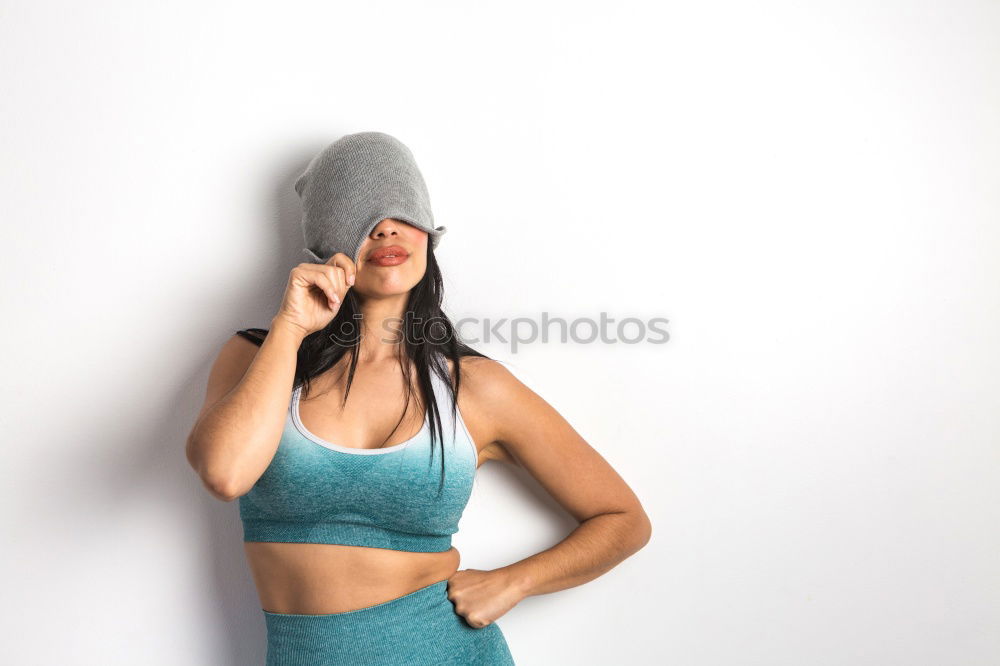 Similar – Woman tying hair in ponytail getting ready for run.