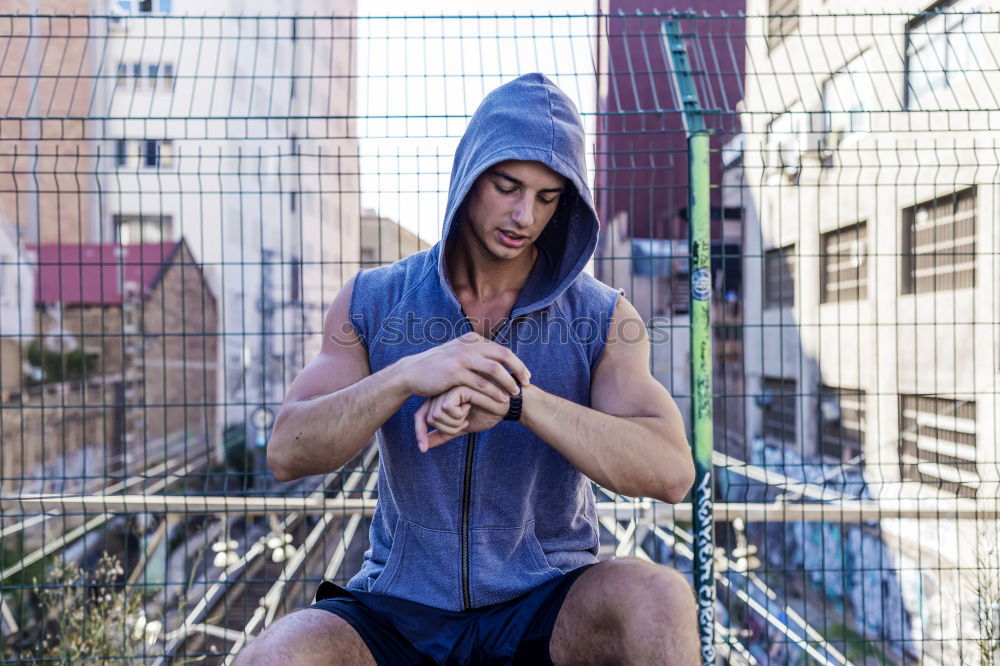 Similar – Muscular man stretching outdoors