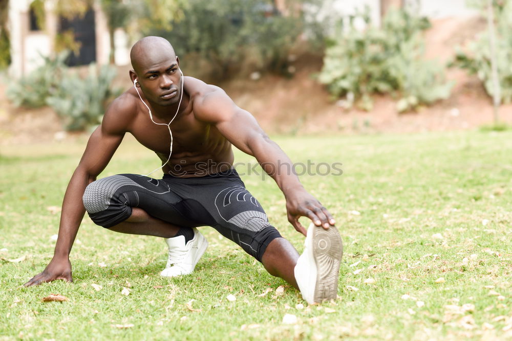 Similar – Athletic black man exercising at the park