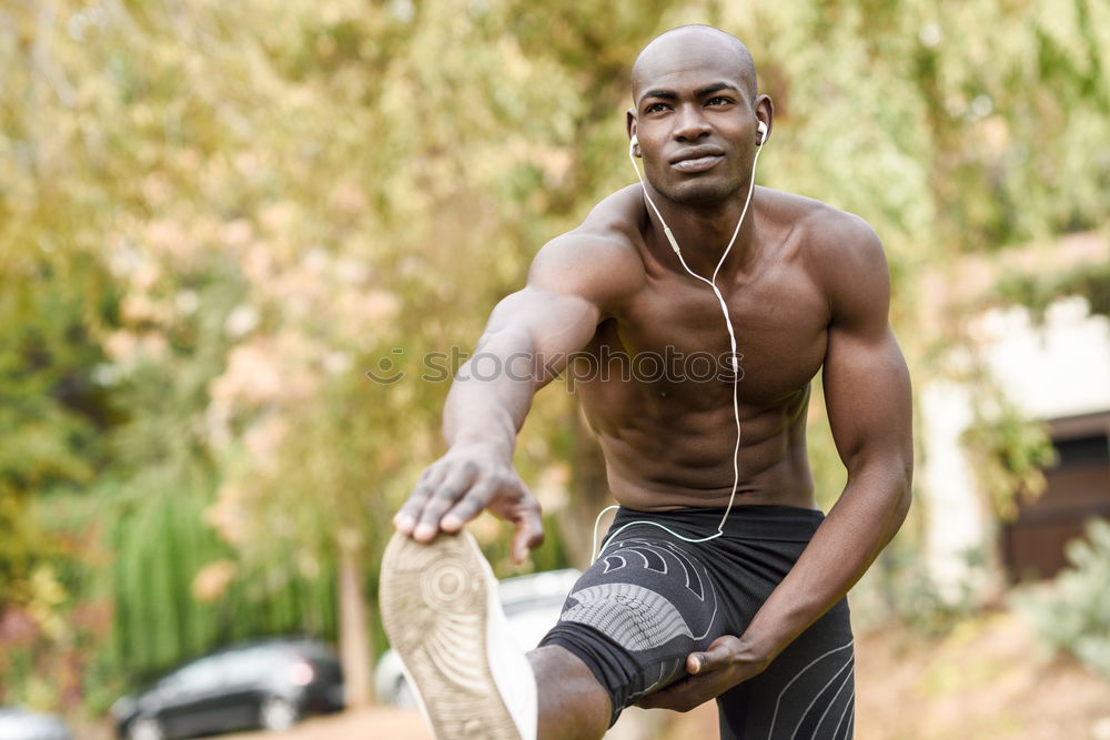 Similar – Athletic black man exercising at the park