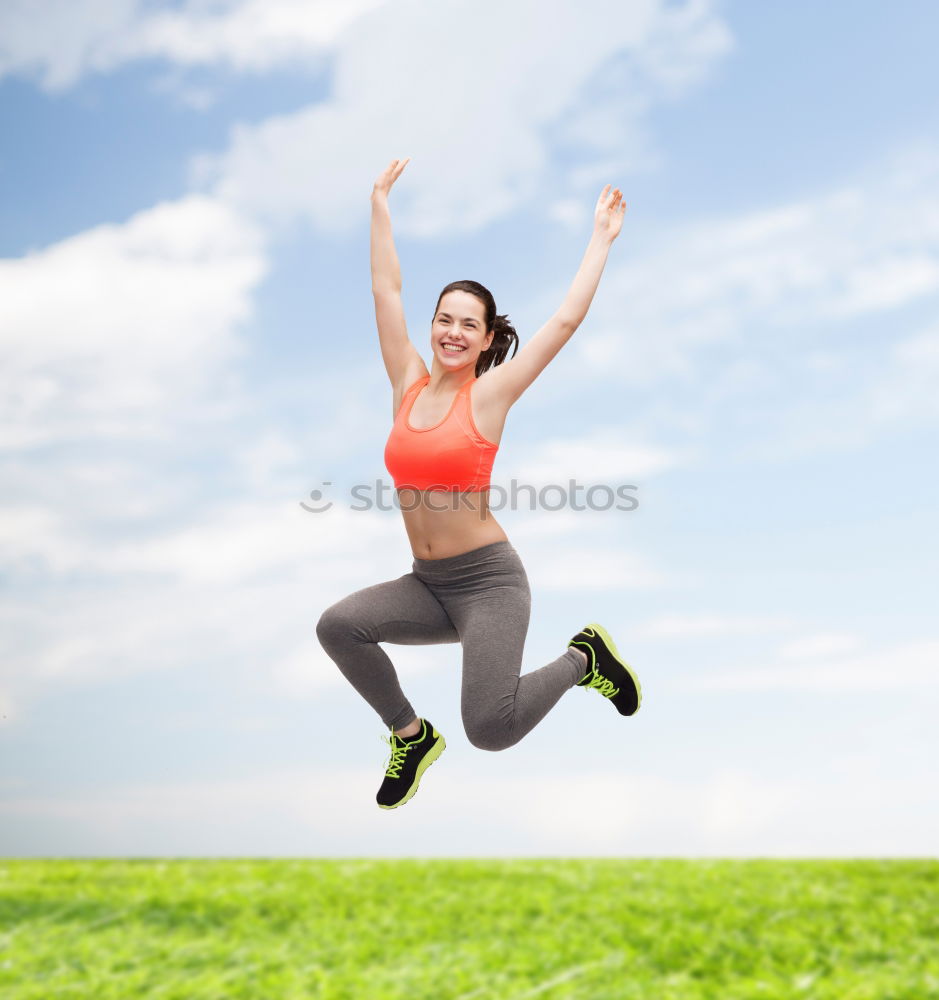 Similar – Young Woman working out outdoors and having fun