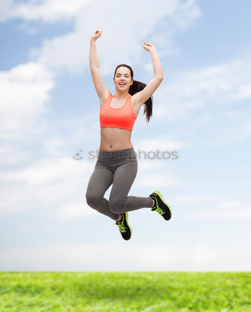 Similar – Young Woman working out outdoors and having fun