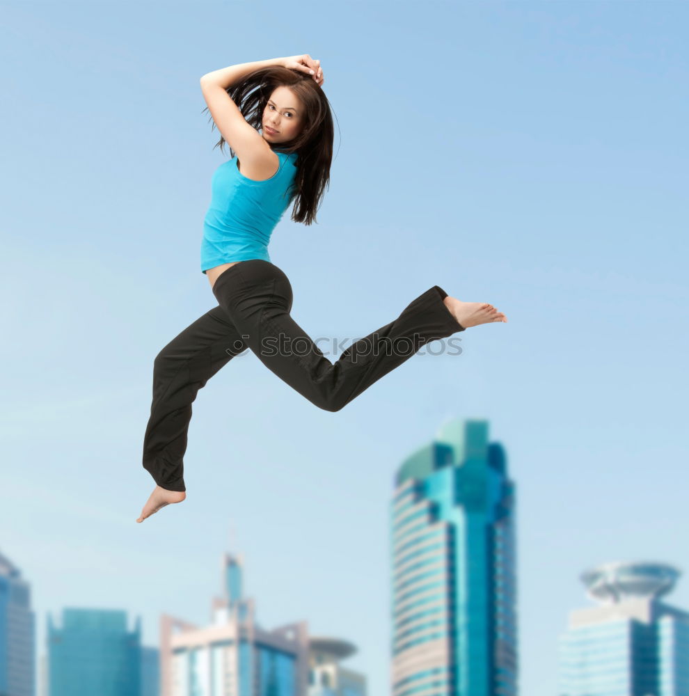 Similar – Young fitness woman runner stretching legs after run.