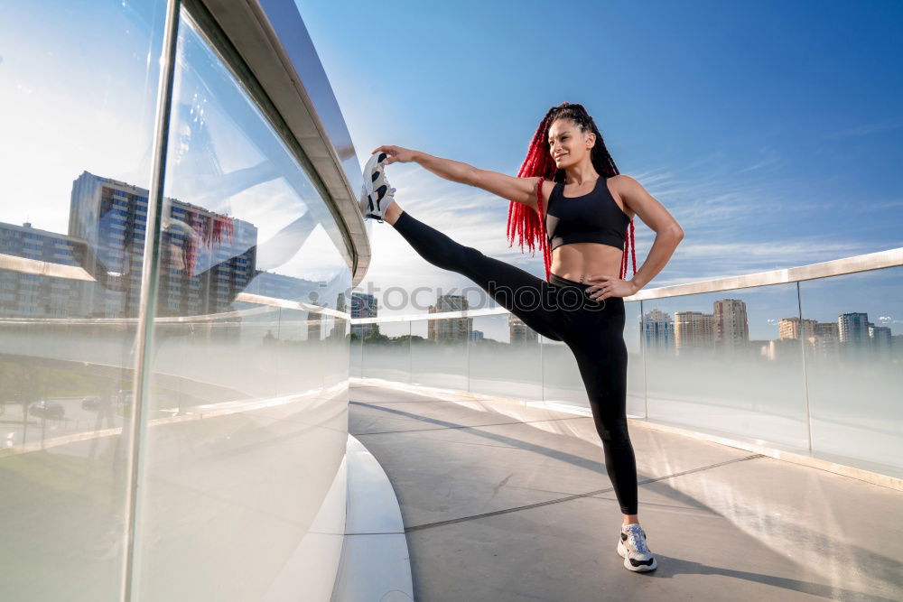 Similar – young woman runner having a rest outdoors