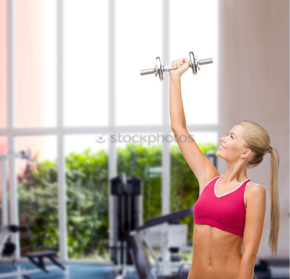 Similar – Young fit woman at the gym doing abs workout